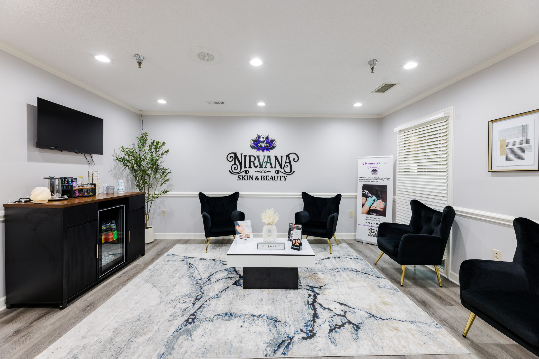 Inside Nirvana Skin & Beauty — calm reception lounge in Charlotte